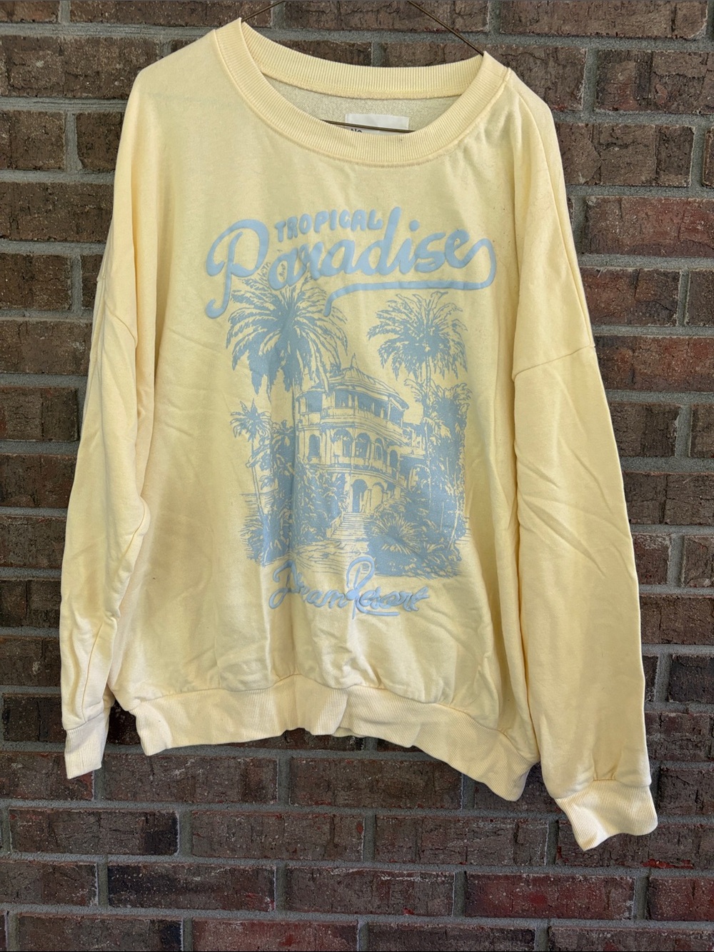 No Boundaries Pale Yellow Crewneck with Light Blue Tropical Graphic